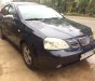 Daewoo Lacetti Ex 2004 - Cần bán gấp Daewoo Lacetti Ex đời 2004, màu xanh lục, 128 triệu