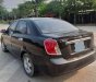 Daewoo Lacetti 2009 - Cần bán xe Daewoo Lacetti sản xuất 2009, màu đen