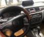 Mitsubishi Lancer   2004 - Bán Mitsubishi Lancer đời 2004, màu đen, máy móc còn nguyên zin