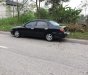 Kia Spectra 2004 - Bán Kia Spectra sản xuất năm 2004, màu đen xe gia đình