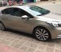 Kia K3 2015 - Cần bán lại xe Kia K3 đời 2015, màu vàng