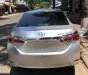 Toyota Corolla altis 1.8G 2014 - Cần bán xe Toyota Corolla altis 1.8G sản xuất 2014, màu bạc xe gia đình, giá chỉ 630 triệu