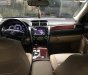 Toyota Camry 2.0E 2013 - Cần bán lại xe Toyota Camry 2.0E năm 2013, màu đen còn mới