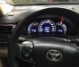 Toyota Camry 2.0E 2013 - Cần bán lại xe Toyota Camry 2.0E năm 2013, màu đen còn mới