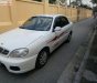 Daewoo Lanos SX 2004 - Gia đình cần bán Daewoo Lanos SX đời 2004, màu trắng, giá 72tr