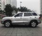 Hyundai Santa Fe Gold AT 2005 - Bán Hyundai Santa Fe Gold màu ghi bạc, 7 chỗ, số tự động, full options, ghế điện máy dầu