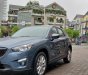 Mazda CX 5 AT 2009 - Cần bán lại xe Mazda CX 5 AT 2009, màu xanh lam, số tự động