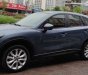 Mazda CX 5 AT 2009 - Cần bán lại xe Mazda CX 5 AT 2009, màu xanh lam, số tự động