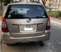 Toyota Innova 2013 - Cần bán lại xe Toyota Innova đời 2013, màu vàng số sàn