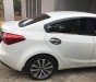 Kia K3 1.6 MT 2015 - Cần bán Kia K3 1.6 MT đời 2015, màu trắng giá cạnh tranh