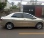 Toyota Vios 1.5E 2010 - Cần bán lại xe Toyota Vios 1.5E sản xuất 2010, màu ghi vàng  