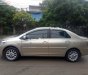 Toyota Vios 1.5E 2010 - Cần bán lại xe Toyota Vios 1.5E sản xuất 2010, màu ghi vàng  