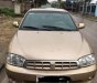 Kia Spectra   2004 - Cần bán lại xe Kia Spectra năm sản xuất 2004, màu vàng