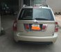 Kia Carens SXMT 2011 - Cần bán xe Kia Carens bản đầy đủ, màu ghi vàng, số sàn, cửa sổ trời