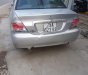 Mitsubishi Lancer 2004 - Cần bán xe Mitsubishi Lancer đời 2004, màu bạc, xe đi ít giữ gìn cẩn thận