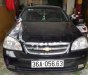 Daewoo Lacetti EX 2005 - Cần bán Daewoo Lacetti Ex đời 2005, màu đen, xe gia đình sử dụng nên rất giữ xe