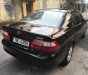 Mazda 626 2.0 MT 2003 - Bán Mazda 626 bản đủ nhất sx 2003, số tay, máy xăng, màu đen, hai túi khí phanh ABS