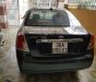 Daewoo Lacetti EX 2005 - Cần bán Daewoo Lacetti Ex đời 2005, màu đen, xe gia đình sử dụng nên rất giữ xe