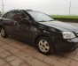Chevrolet Lacetti EX 2010 - Bán Chevrolet Lacetti EX 2010, màu đen, xe gia đình 
