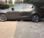 Mazda 2    2016 - Bán xe Mazda 2 năm sản xuất 2016 số tự động, màu nâu vàng, nội thất còn mới