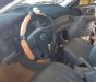 Mazda 323 2004 - Bán ô tô Mazda 323 sản xuất 2004, màu đen chính chủ, giá 145tr