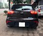 Kia Rio 1.4 AT  2015 - Bán ô tô Kia Rio 1.4 AT sản xuất 2015, màu nâu, xe nhập, giá 599tr