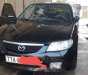 Mazda 323 2004 - Bán ô tô Mazda 323 sản xuất 2004, màu đen chính chủ, giá 145tr