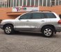 Hyundai Santa Fe Gold  2004 - Bán ô tô Hyundai Santa Fe Gold đời 2004, màu bạc, keo chỉ nguyên zin