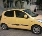 Hyundai i10   2010 - Bán ô tô Hyundai i10 đời 2010, màu vàng, đi được khoảng 86.000km