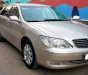 Toyota Camry 3.0 2002 - Cần bán Toyota Camry 3.0 sản xuất 2002, màu vàng giá cạnh tranh