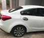 Kia K3 MT 2015 - Cần bán lại xe Kia K3 MT đời 2015, màu trắng xe gia đình, giá 420tr