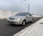 Chevrolet Lacetti 2012 - Cần bán gấp Chevrolet Lacetti năm 2012, màu bạc