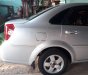 Daewoo Lacetti EX 2009 - Cần bán xe Daewoo Lacetti EX sản xuất năm 2009, màu bạc số sàn