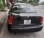 Daewoo Lanos   2003 - Cần bán Daewoo Lanos 2003, màu đen