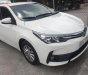 Toyota Corolla altis 1.8E 2017 - Bán xe Toyota Corolla altis 1.8E sản xuất 2017, màu trắng chính chủ, 690 triệu