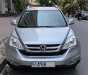 Honda CR V 2010 - Cần bán Honda CR-V 2010 màu bạc, máy xăng AT 2.4L