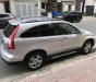 Honda CR V 2010 - Cần bán Honda CR-V 2010 màu bạc, máy xăng AT 2.4L