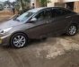 Hyundai Accent 2014 - Bán ô tô Hyundai Accent sản xuất năm 2014, màu nâu chính chủ giá cạnh tranh