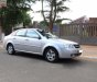 Daewoo Lacetti EX 2009 - Bán xe Daewoo Lacetti EX sản xuất 2009, màu bạc giá cạnh tranh