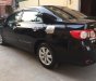 Toyota Corolla altis 2014 - Gia đình bán Toyota Corolla altis đời 2014, màu đen số tự động, 548tr