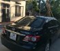 Toyota Corolla altis 2014 - Chính chủ bán lại xe Toyota Corolla altis đời 2014, màu đen