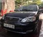 Toyota Corolla altis 1.8G MT 2005 - Bán Toyota Corolla altis 1.8G MT sản xuất năm 2005, màu đen số sàn, giá chỉ 285 triệu