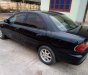 Mazda 323 2000 - Bán Mazda 323 2000, còn tương đối nguyên bản, màu xanh đen quyền lực