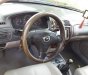 Mazda 323  1.6 L 2004 - Bán xe Mazda 323 1.6 L đời 2004, màu đen, xe công chức đi làm