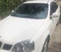 Daewoo Lacetti  MT 2004 - Bán ô tô Daewoo Lacetti MT sản xuất năm 2004, màu trắng, nội thất zin nguyên bản