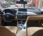 BMW 3 Series 320i 2012 - Bán xe BMW 3 Series 320i sản xuất 2012, màu đen, nhập khẩu còn mới 