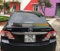 Toyota Corolla altis  MT  2011 - Bán gấp Toyota Corolla altis MT sản xuất 2011, màu đen, số sàn