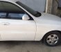 Daewoo Lanos   2003 - Cần bán gấp Daewoo Lanos năm sản xuất 2003, màu trắng, côn số ngọt ngào
