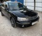 Ford Laser 2004 - Cần bán gấp Ford Laser 2004, màu đen