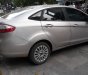 Ford Fiesta S 2013 - Chính chủ (dùng từ mới) cần bán Ford Fiesta 2013, màu vàng cát